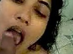 Amateur Indian girl gives a blowjob in a bathroom