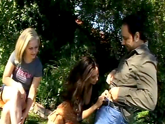 Aaralyn and Tiffany give hot blowjob to two dudes in a park
