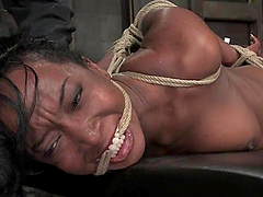 Luscious ebony slut gets tied up and tortured