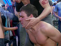 A lewd poofter gets his butt drilled in a shop in gangbang clip