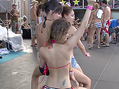 Tattooed pornstars in bikini dancing wildly in a party outdoor in reality shoot