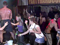 Crazy women at a party suck and fuck the male strippers on stage