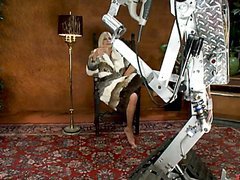 Busty Blonde MILF Fucked By a Human-Shaped Machine