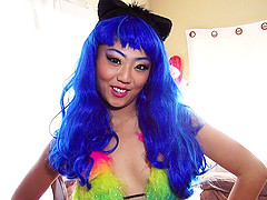 Asian cosplay girl in a blue wig wants dick in her pussy