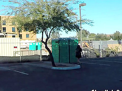 Teen swallows strangers cum in porta potty gloryhole in public parking lot