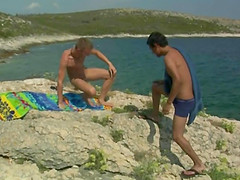 Twinks have outdoor sex by the water