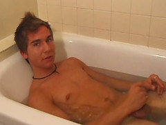 Brock is spending some down time, in the bathtub, stroking his cock.