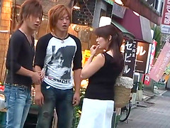 Japanese woman offers her amazing body to a couple of men