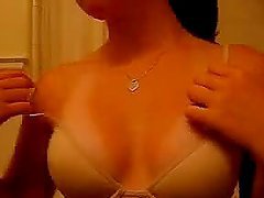Perfect tittie bitch playing with her knockers here