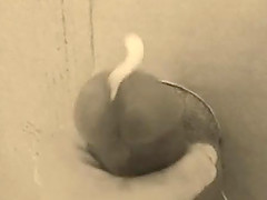Jerking his big cock through our gloryhole