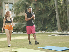 Sultry Redhead Babe Gets Rocked by Dark Stud in Outdoor Sports Shorts Frenzy