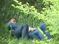 Horny couple feels an urge to caress each other in a park