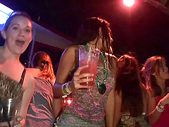 Girls in miniskirts get caught on a voyeur's cam in a club