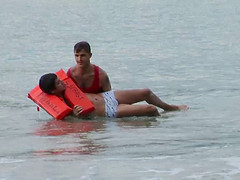 Horny gay fellow fucks a lifeguard on a nice beach